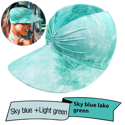 Turquoise visor cap with a woman wearing it inset on a white background