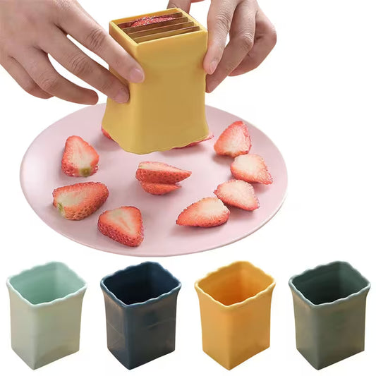 Yellow strawberry cutter with sliced strawberries on a pink plate, surrounded by four color options.
