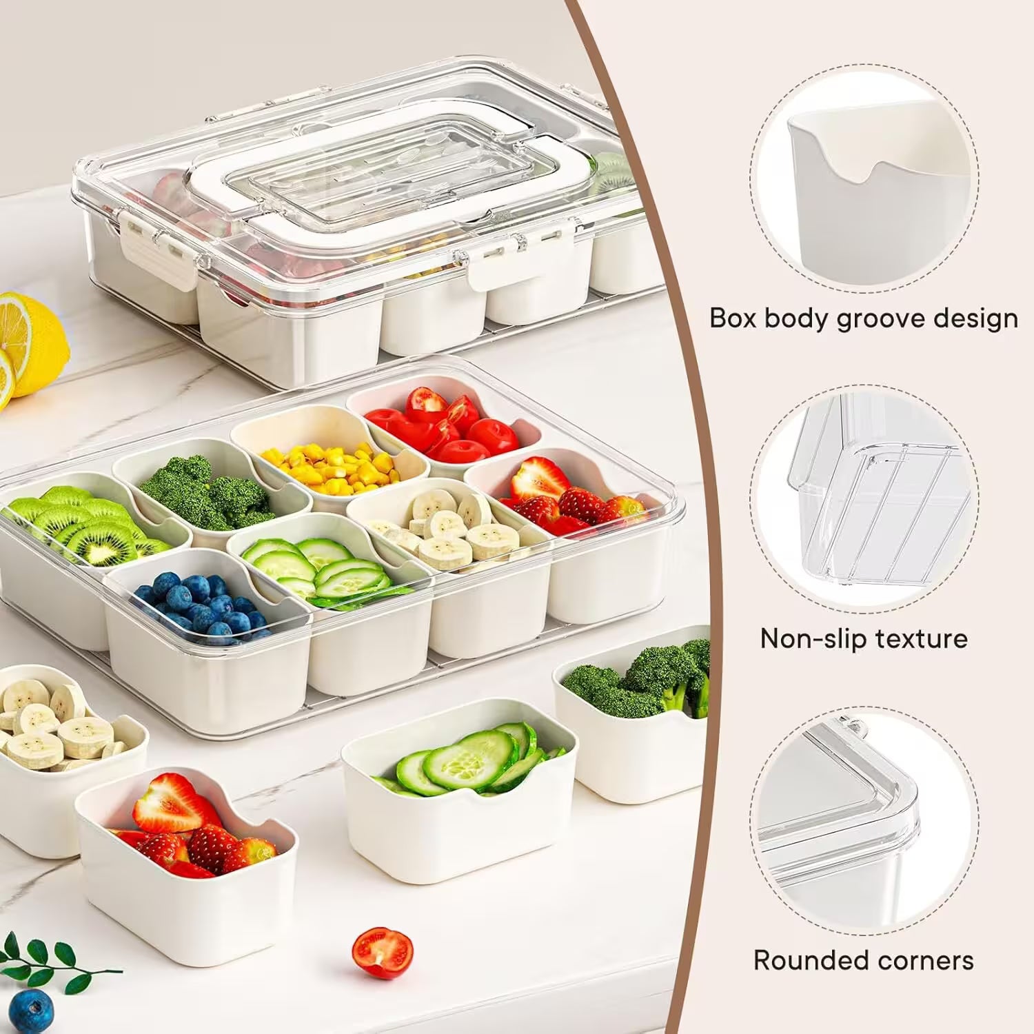 Meal prep container with compartments filled with fruits and vegetables on a white surface.