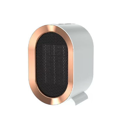 White and rose gold speaker on a white background