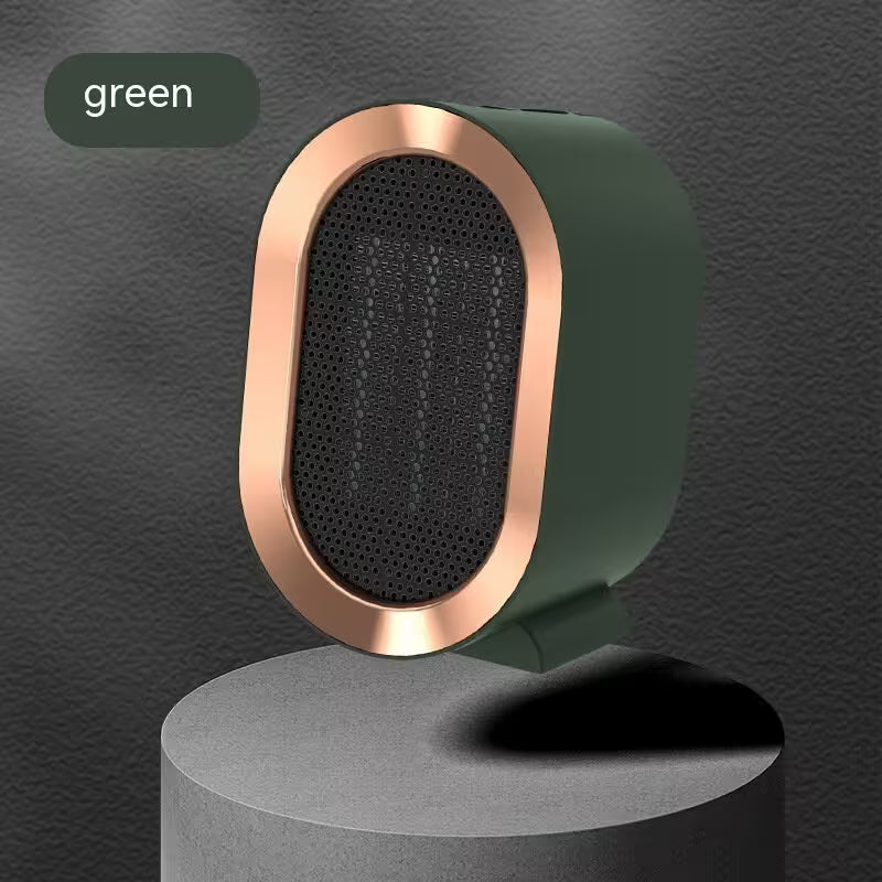 Green and rose gold speaker on a gray pedestal with a dark gray background