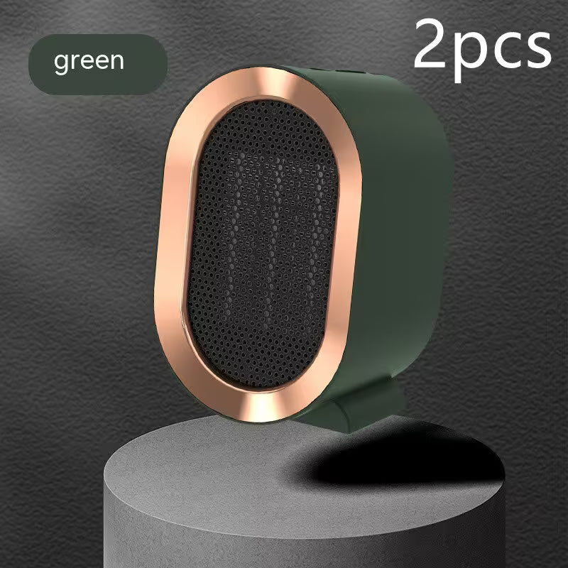 Green and rose gold speaker on a gray pedestal with a dark gray background