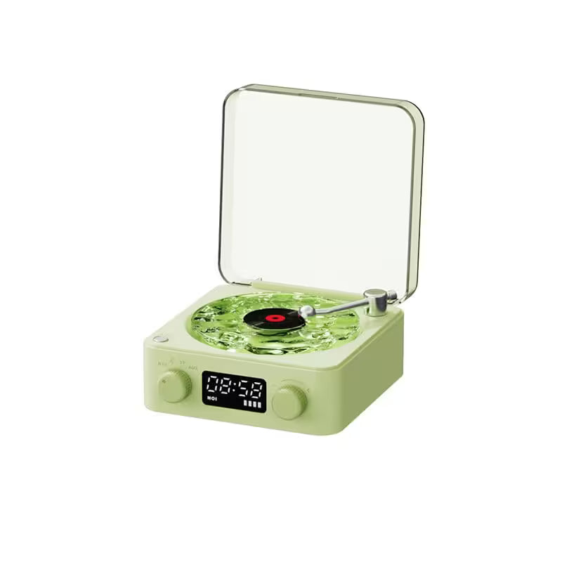 Green record player with digital display on a white background