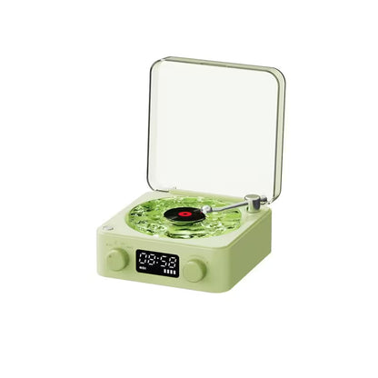 Green record player with digital display on a white background