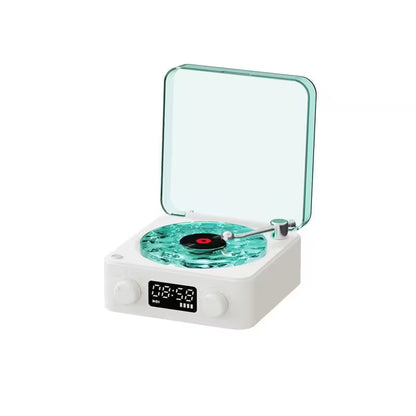 Small record player with a digital display on a white background