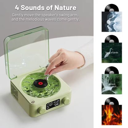 Green record player with a hand interacting with it, alongside images of vinyl records labeled '4 Sounds of Nature'.