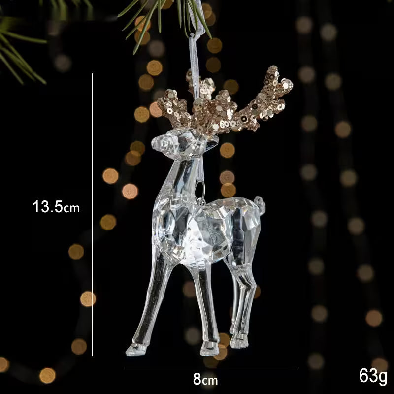 Clear reindeer ornament with gold antlers on a dark background with bokeh lights