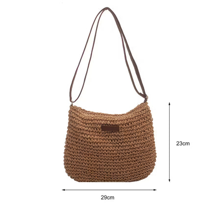 Brown woven handbag with a strap, shown with dimensions on a white background