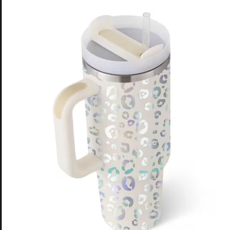 Leopard print mug with a handle and lid on a white background