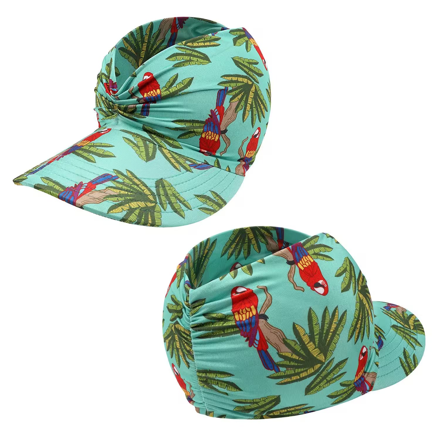 Two turquoise hats with parrot and leaf pattern on a white background