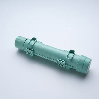 Green cylindrical object on a light gray background
