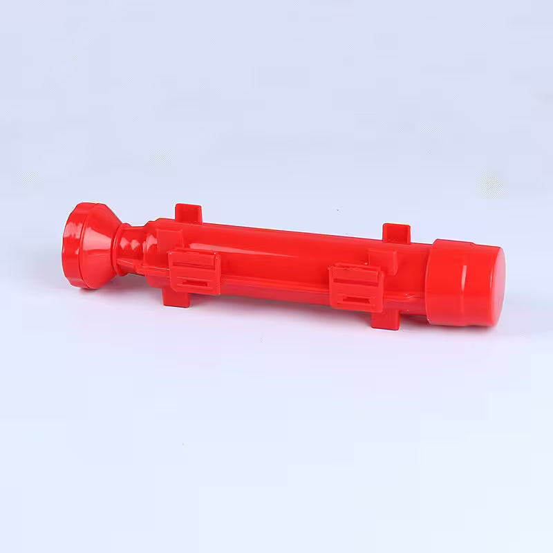 Red cylindrical plastic object on a white background