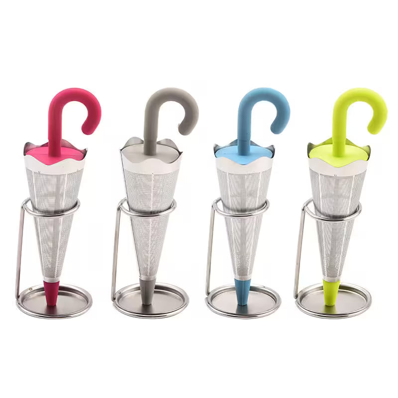 Set of four colorful umbrella-shaped tea infusers on stands with a white background