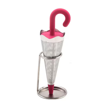 Tea infuser shaped like a pink umbrella on a white background