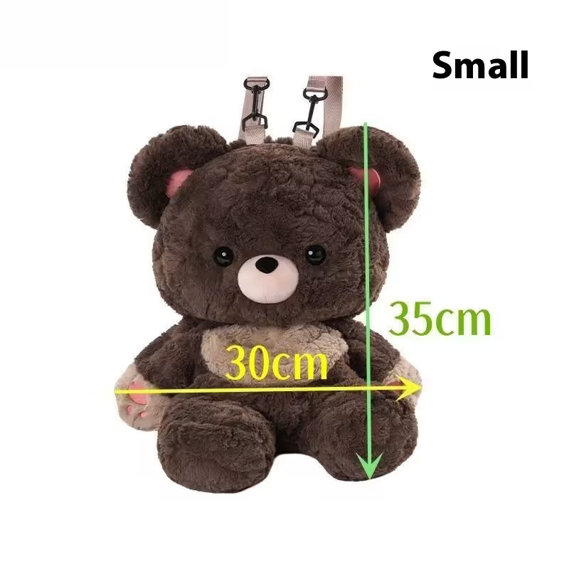 Small brown teddy bear with measurements on a white background