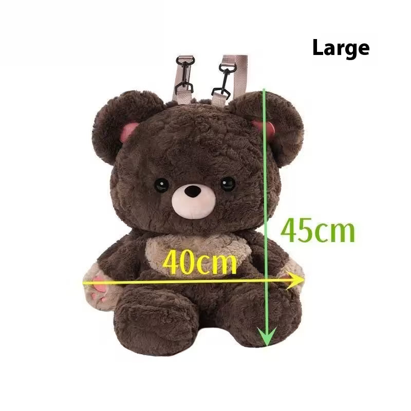 Plush bear toy with measurements on a white background