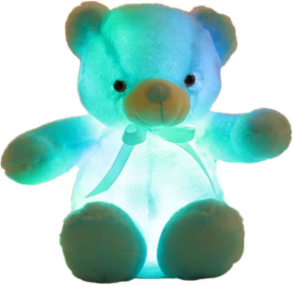 Glowing blue teddy bear on a white background