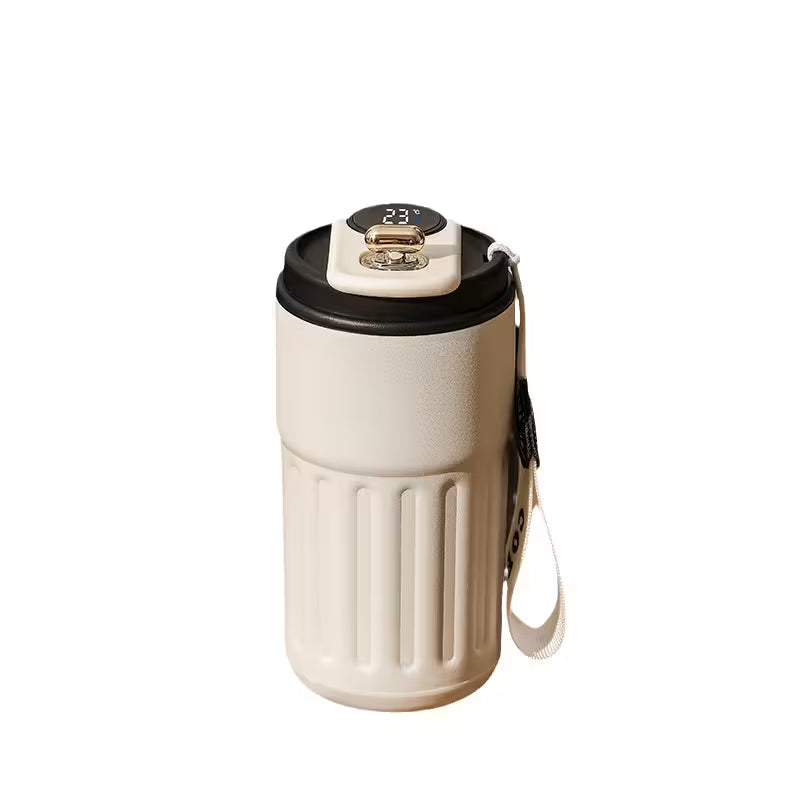 White travel mug with black lid on a white background