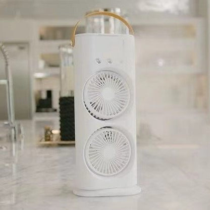 White cylindrical fan with decorative elements on a blurred background