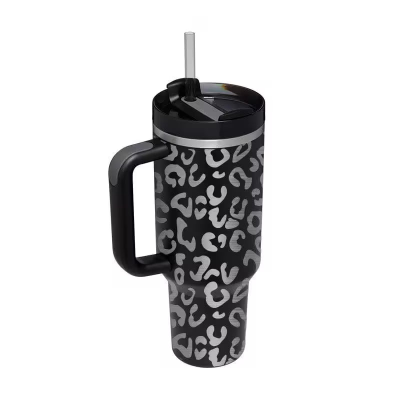 Black tumbler with white pattern on a white background
