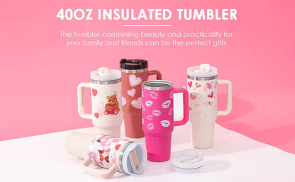 Set of insulated tumblers with various designs on a pink background