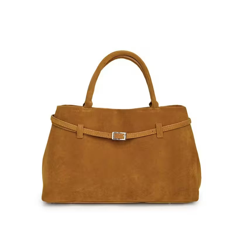 Brown handbag with a strap and buckle on a white background