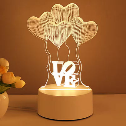 Decorative lamp with heart shapes and 'LOVE' text on a warm background