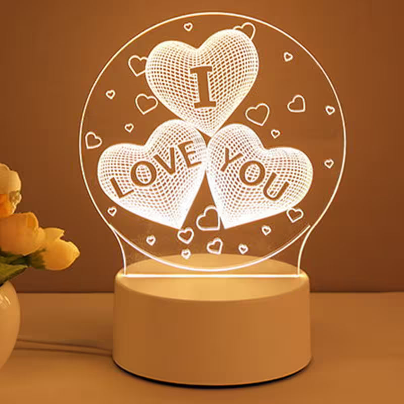 Decorative lamp with 'I LOVE YOU' text in a heart shape on a brown background