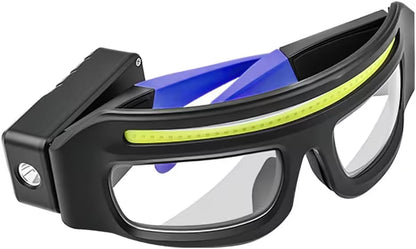 Black safety goggles with clear lenses on a white background