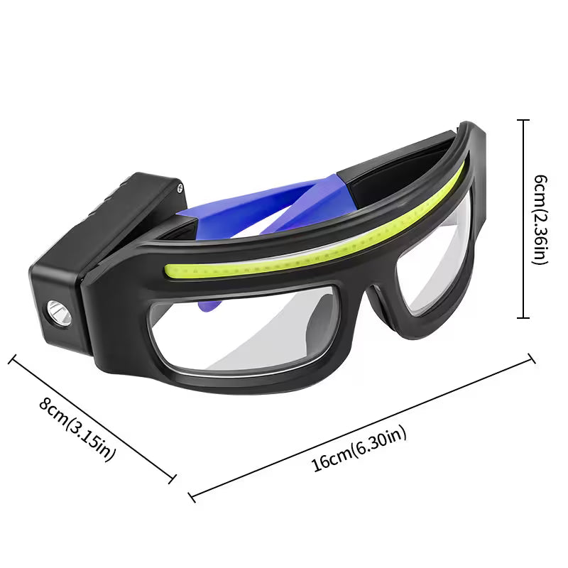 Black safety goggles with blue interior and clear lenses, shown with measurements on a white background.
