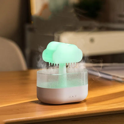 Humidifier with cloud-shaped top on a wooden surface