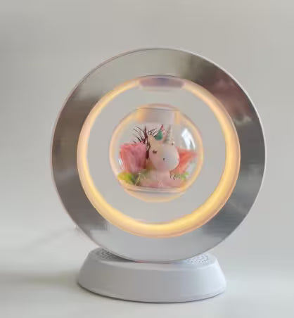 Decorative sphere with a unicorn design on a white background