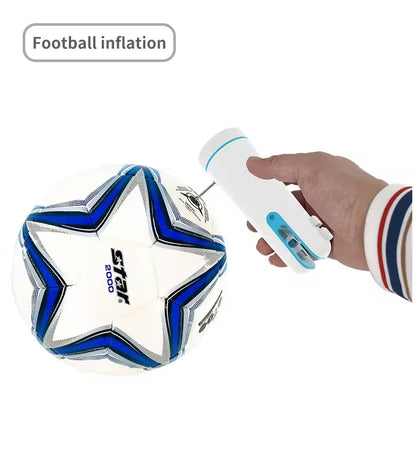 Hand inflating a soccer ball with a Star 2020 branded ball and an inflation device on a white background.