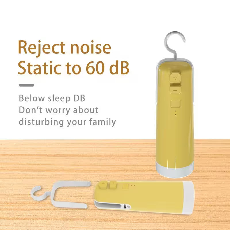 Yellow noise machine with a hook on a wooden surface, featuring text about noise rejection capabilities.