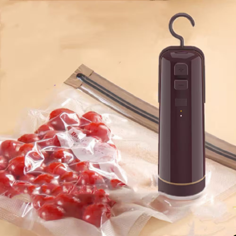 Vacuum sealer with cherry packaging on a beige surface