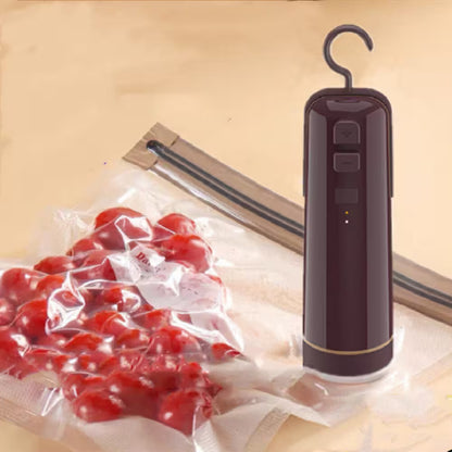 Vacuum sealer with cherry packaging on a beige surface