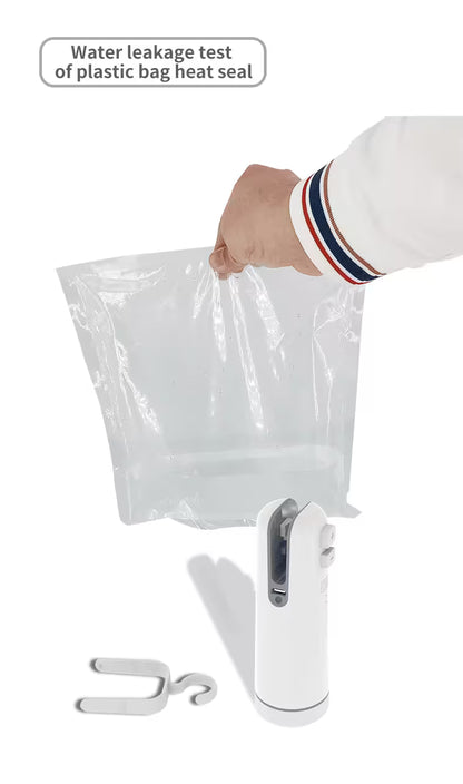 Hand holding a plastic bag with a heat sealer on a white background