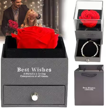 Gray gift box with a red rose and jewelry, labeled 'Best Wishes'.