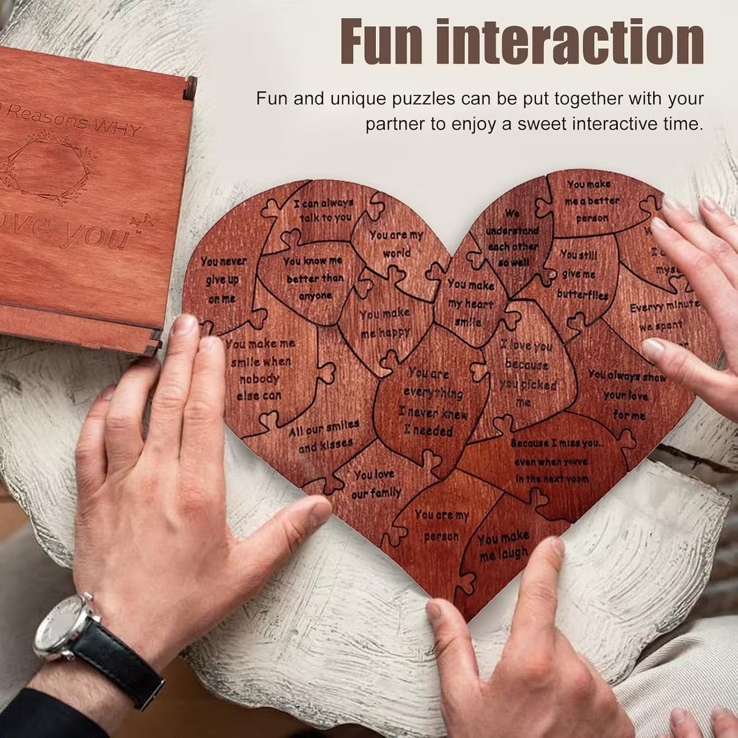 Heart-shaped wooden puzzle with engraved messages, held by two people, with text about fun interaction.