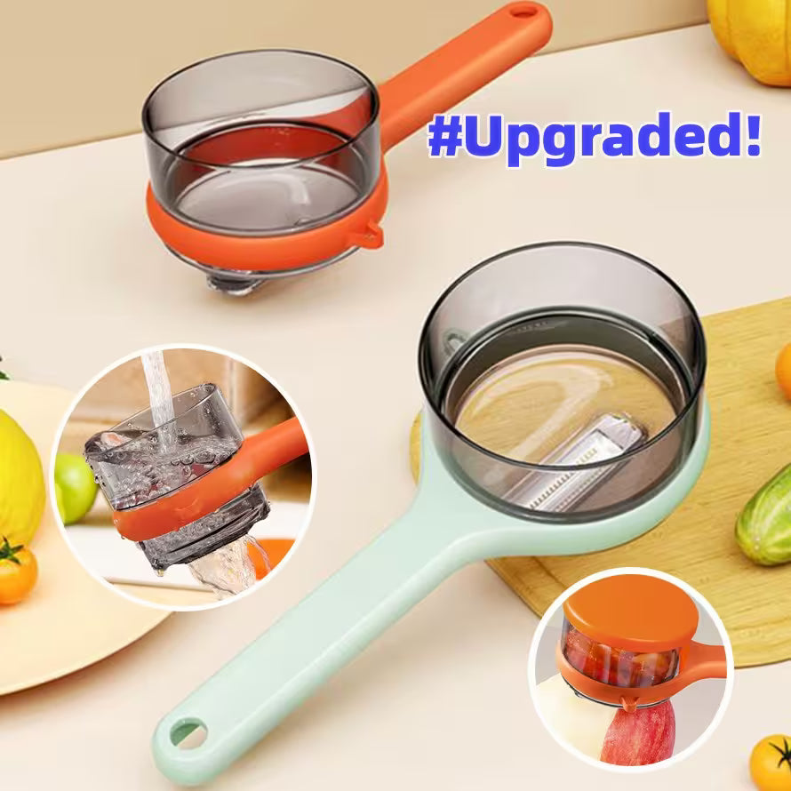 Two kitchen tools with handles, one orange and one green, on a light background.