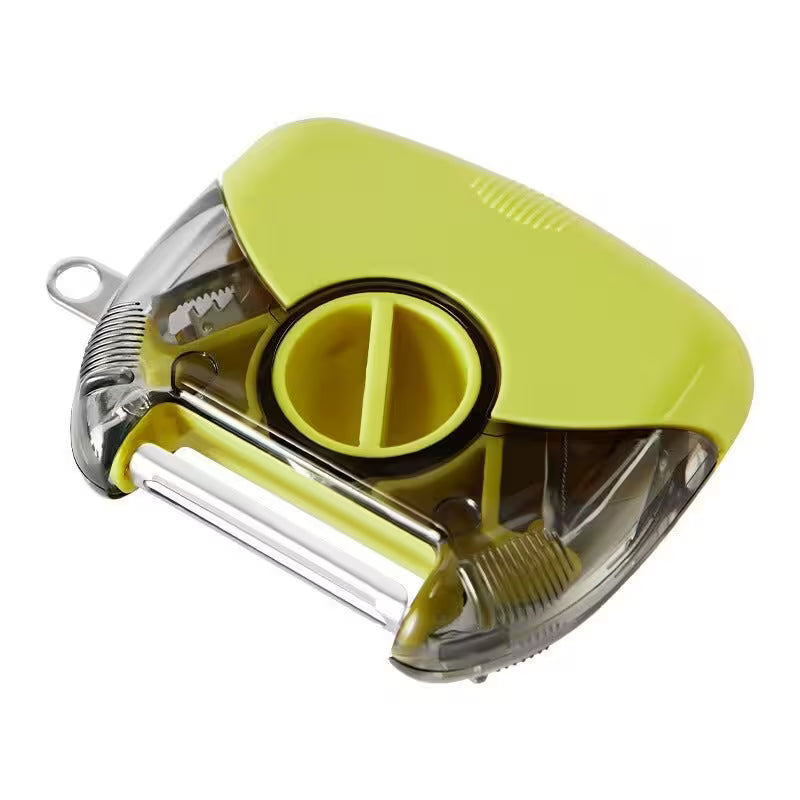 Yellow kitchen peeler on a white background