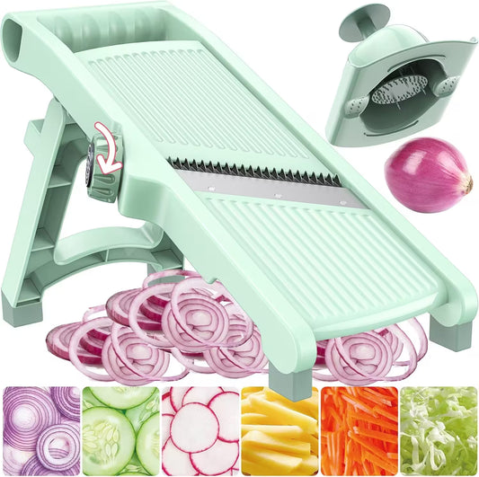 Mint green mandoline slicer with sliced onions and vegetable slices displayed.