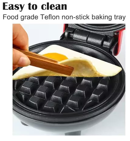Waffle maker with food grade Teflon non-stick surface being used to cook waffles.