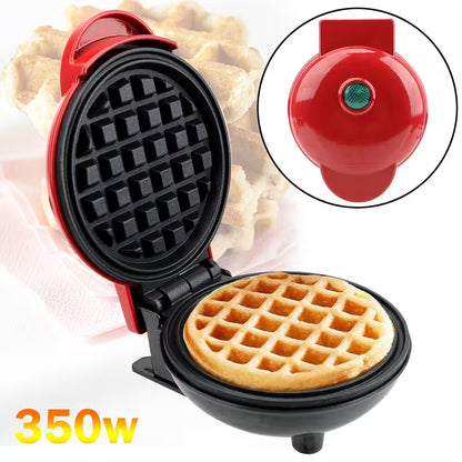 Mini waffle maker with a cooked waffle inside, showing the brand logo.