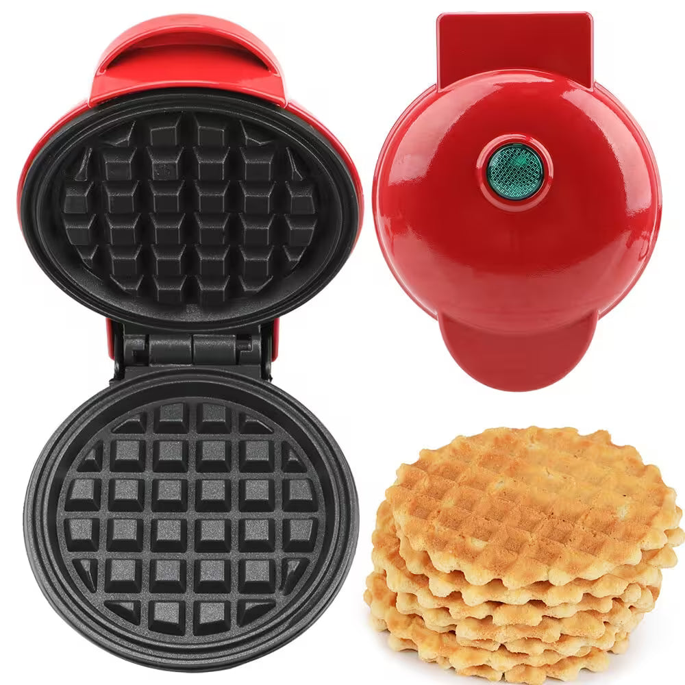 Red waffle maker with open lid showing waffle pattern, closed lid, and stack of waffles on a white background.