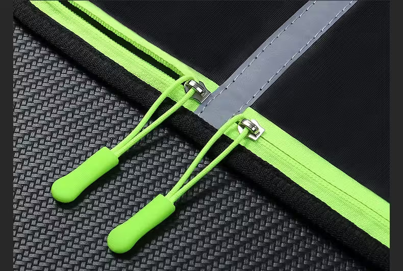 Close-up of a green zipper on a textured surface