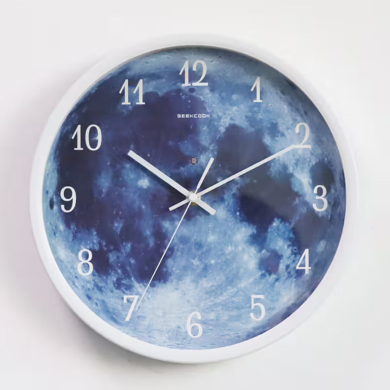 Wall clock with moon surface design on a white background