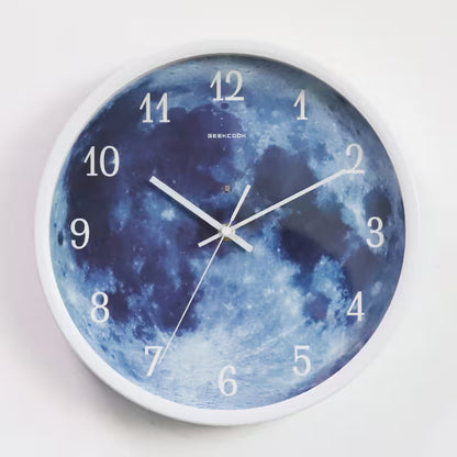 Wall clock with moon surface design on a white background