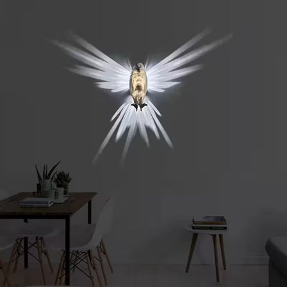 Light fixture shaped like a bird with spread wings on a dark wall above a dining table.