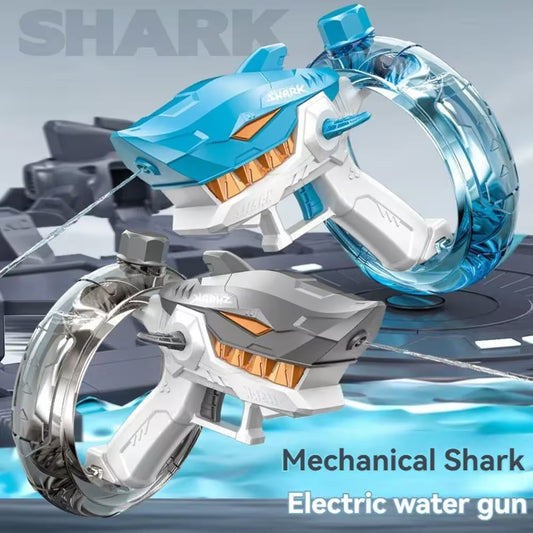 Mechanical shark electric water gun with blue and silver design on a gray background